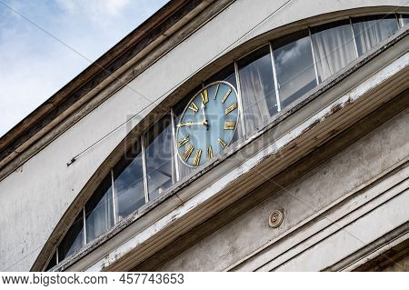 Brussels Old Town, Brussels Capital Region, Belgium - 06 26 2022 - Facade And Clock Of The Hospice P