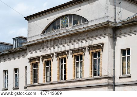 Brussels Old Town, Brussels Capital Region, Belgium - 06 26 2022 - Facade And Clock Of The Hospice P