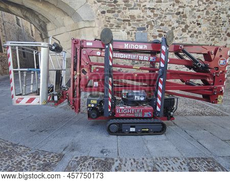 Caceres, Spain - Jun 29th, 2022: Remote Control Aerial Platform Moving Through Caceres Old Quarter. 