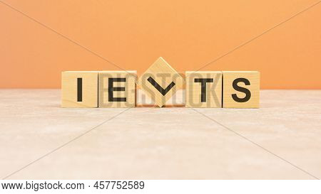 Ielts Word Written On Wood Block. Content Text On Wooden Table For Your Desing, Concept.