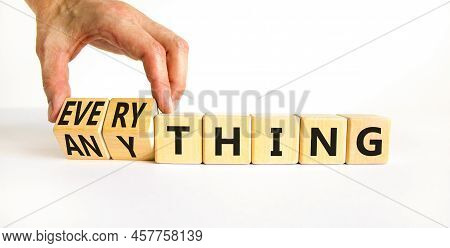 Anything Or Everything Symbol. Businessman Turns Cubes And Changes The Concept Word Anything To Ever