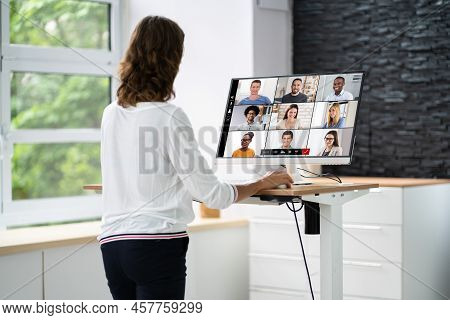 Video Conference Call Using Electric Adjustable Height Standing Desk