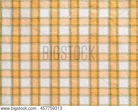 Checkered Cotton Fabric Background. Macro Texture Of White Orange Kitchen Towel. Detail Of Cloth Tex