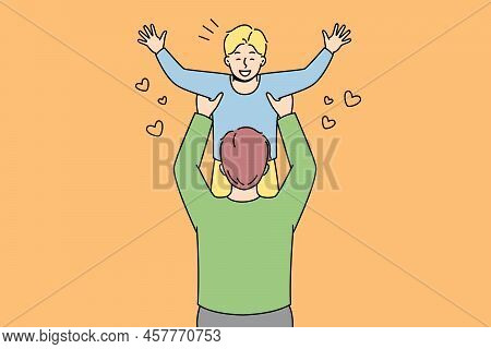 Happy Father Holding In Arms Playing With Excited Small Son. Loving Dad Have Fun On Weekend With Smi