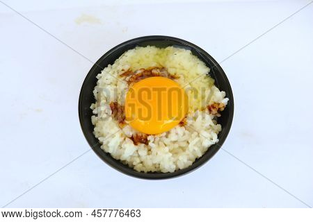 Tamago Kake Gohan Or Raw Egg On Rice. \ntraditional Food From Japan, Eat On Breakfast
