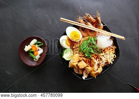 Laksa, Laksa Curry Made From Vermicelli, Noodles, Bean Sprouts, Egg, Tofu Lime, And Shrimp With A Sp