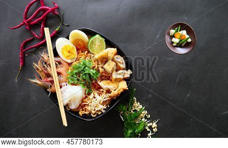 Laksa, Laksa Curry Made From Vermicelli, Noodles, Bean Sprouts, Egg, Tofu Lime, And Shrimp With A Sp