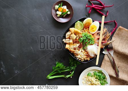 Laksa, Laksa Curry Made From Vermicelli, Noodles, Bean Sprouts, Egg, Tofu Lime, And Shrimp With A Sp