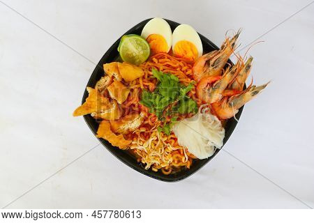 Laksa, Laksa Curry Made From Vermicelli, Noodles, Bean Sprouts, Egg, Tofu Lime, And Shrimp With A Sp