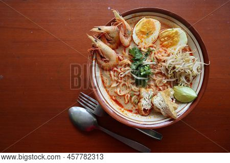 Laksa, Laksa Curry Made From Vermicelli, Noodles, Bean Sprouts, Egg, Tofu Lime, And Shrimp With A Sp