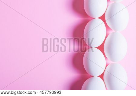Creative Happy Easter, Food Card, Egg White Shell On A Pink Background.