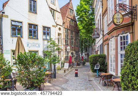 Bremen, Germany - May 18, 2022: Old Houses At The Cobblestoned Street Of Th Schnoor District Of Brem