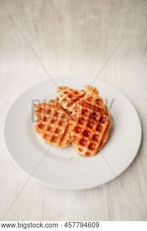 Croissant Waffle Or Croffle With Chocolate Sauce Served In Box And White Background