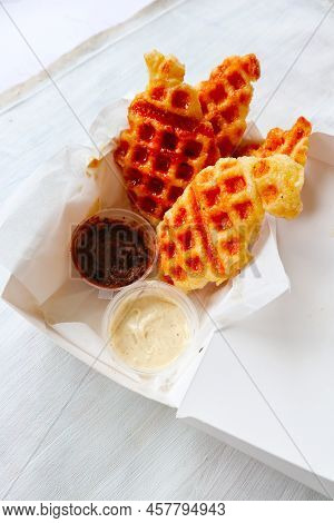 Croissant Waffle Or Croffle With Chocolate Sauce Served In Box And White Background