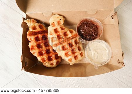 Croissant Waffle Or Croffle With Chocolate Sauce Served In Box And White Background