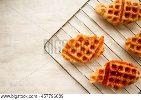 Croissant Waffle Or Croffle With Chocolate Sauce Served In Box And White Background