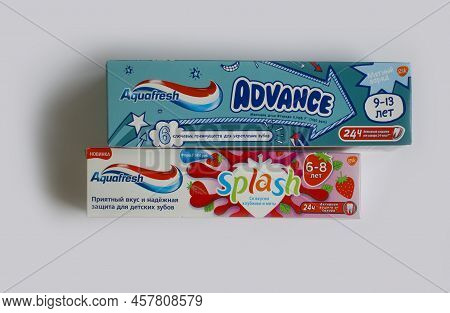 July 7, 2022 Ukraine City Kyiv Children\'s Toothpaste From The Aquafresh Company On A Colored Backgr