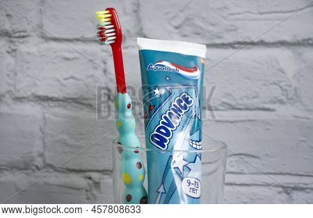 July 7, 2022 Ukraine City Kyiv Children\'s Toothpaste From The Aquafresh Company On A Colored Backgr