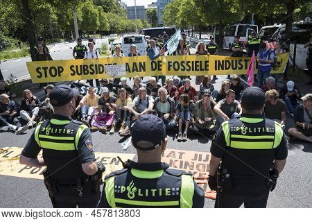 07062022.the Hague ,the Netherlands Extinction Rebellion Protest.protesters Blocking The A12 Near Th