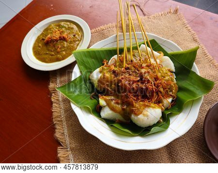 Sate Padang Or Satay Padang Is Spicy Beef Satay From Padang, West Sumatra. Served With Spicy Curry S