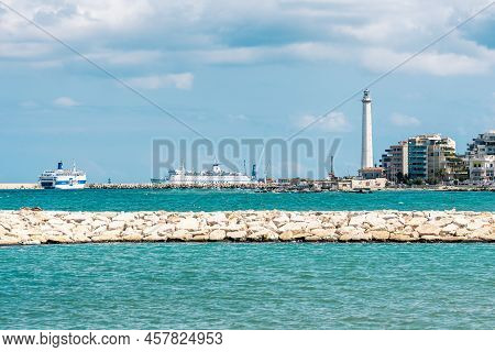 Bari, Puglia, Italy - August 29 2021: Bari Port Or Harbor With Breakwater, Cruise Ships And Lighthou