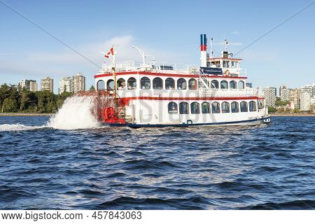 Vancouver, British Columbia, Canada - June 23, 2022: Sternwheeler Passing By Stanley Park And Citysc