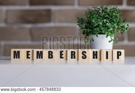 Focus On Wooden Blocks With Letters Making Membership Text. Concept Image.