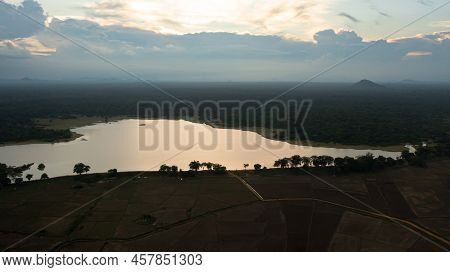 Aerial View Of Lake And Rainforest During Sunset. National Park In Sri Lanka.