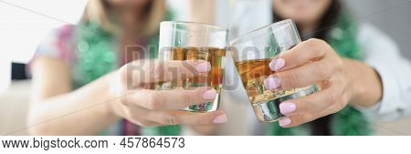 Close-up Of Best Friends Doing Clink With Glasses Filled With Tasty Champagne Drink. Sisters Meet Fo