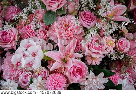 Big Bouquet Of Flowers In A Vase On A Gray Wall Background
