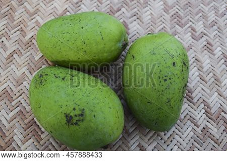 Top View Of Green Raw Mango Fruit. Fresh Organic Indian Fruits