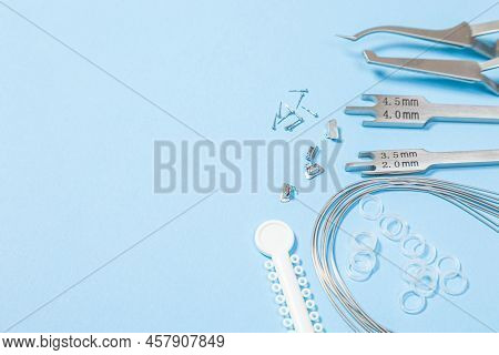 A Set Of Special Tools For An Orthodontist To Install Braces For A Patient. Orthodontic Arcs, Ligatu