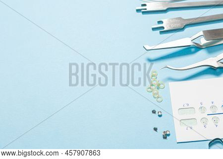 A Set Of Special Tools For An Orthodontist To Install Braces For A Patient. Orthodontic Arcs, Ligatu