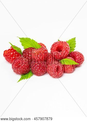 Ripe Raspberries With Leaf Isolated On A White Background