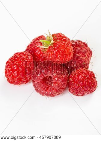 Set Of Beautiful And Ripe Raspberries Isolated On White Background