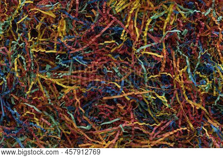 Red, Yellow, Blue, Green, Orange Pieces Of Shredded Paper Closeup For Backdrop