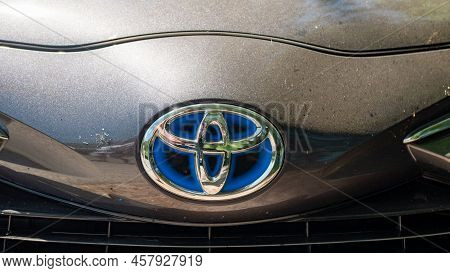 Italy, Ambruzzo - August 28, 2021 - Close Up Of Toyota Car Logo On A Black Toyota Car. Toyota Motor 