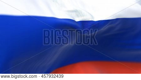 Close-up View Of The Russian National Flag Waving In The Wind. Russia Is A Transcontinental Country 