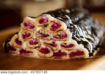 Close-up Of A Cherry Cake - Monastic Log On Wooden Surface. Pastry Item. Pastry Item, Homemade Confe