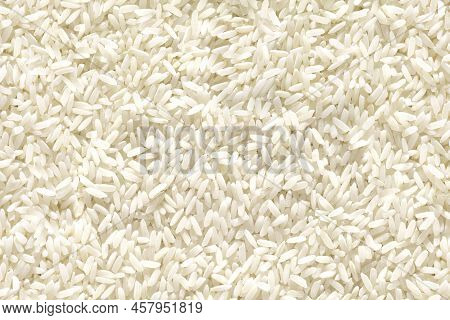 Medium And Round Grain White Jasmine Rice Texture For Background. Organic Natural Food Background Wi