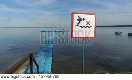 No Diving Sign At Beach, Lake Naroch, Belarus. Warning Sign Of Shallow Water. Warning Notice Sign Do