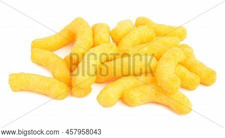 Many Tasty Cheesy Corn Puffs Isolated On White