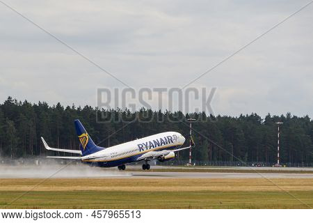 Ryanair Boeing 737-8as Takes Off From The Runway At Riga International Airport. Riga International A