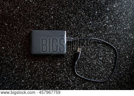 External Hdd Wd Elements Portable In A Black Case With A Wire On A Black Background. A Useful Portab