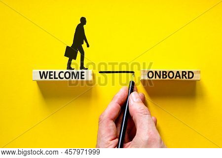 Welcome Onboard Symbol. Concept Words Welcome Onboard On Wooden Blocks On A Beautiful Yellow Table Y