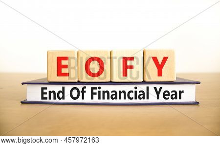 Eofy End Of Financial Year Symbol. Concept Words Eofy End Of Financial Year On Wooden Blocks On Beau