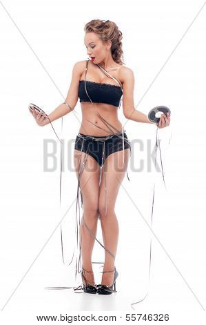 Attractive Woman With An Audio Retro Bobbins