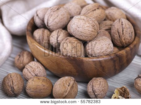 Walnuts In A Wooden Cup