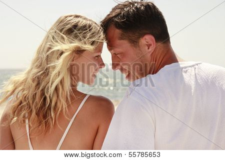 Couple In Love On The Shore Of The Sea