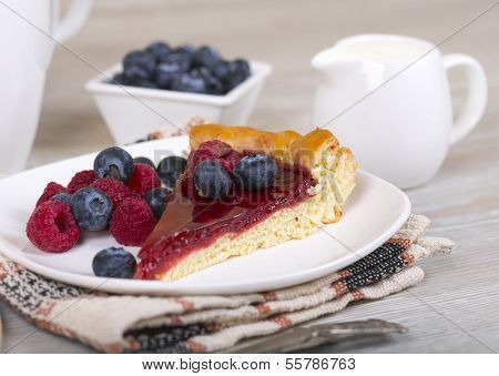 Slice Of Raspberry Pie With Fresh Berries